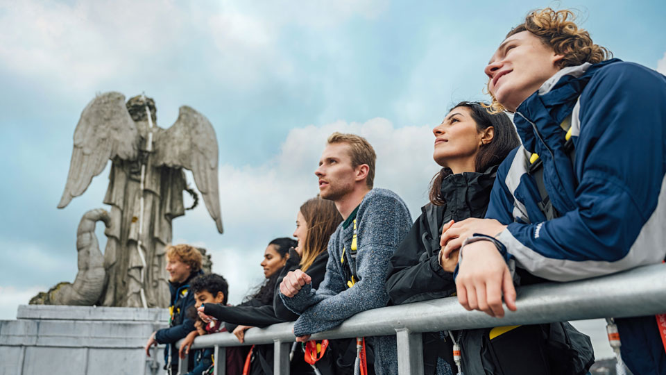 Visitors enjoying panoramic London views from the Summit roof walk at Alexandra Palace