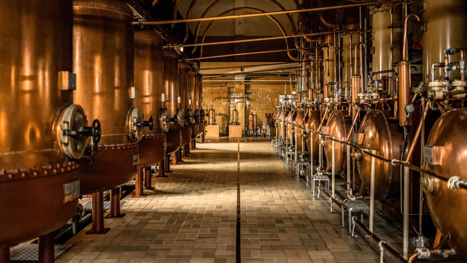 Copper distillation stills at Maison Cointreau in Angers, France.