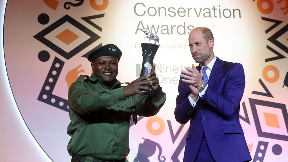 Laban Mwangi with H.R.H. The Prince of Wales at the 2025 Tusk Conservation Awards in London.